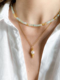 AELIA NECKLACE Aquamarine beaded necklace with gold lated details Dimensions: Total necklace length  42cm / 16.53 in + 5cm / 1.96in  extender chain Weight: 20gr DELIVERY (estimate delays) Greece: 2-5 business days via ELTA  Europe: 5-10 business days via Hellenic Post International: 10-21 business days via Hellenic Post You can shorten considerably your delivery times by upgrading to DHL Express services at checkout.  All PURE GREEK Jewels  are inspired from the ancient greek arts, folklore traditions and world cultures. Our jewelry are handmade with love and imagination so you can enjoy unique creations.   I use mineral and semi-precious stones, crystals, real pearls,  gold plated brass metal, wooden elements, greek and oriental charms, pompons and feathers. I only use high quality materi Gold Crystal Choker Necklaces With Gemstone Beads, Delicate Gold Beaded Necklaces With Natural Stones, Gold Beaded Choker With Natural Stones, Heishi Necklace, Ancient Greek Art, Aquamarine Necklace, Aquamarine Beads, Greek Art, Real Pearls