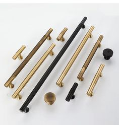 an assortment of brass door handles and knobs