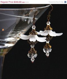 CIJ ChristmasInJuly SALE Snow White Bridal by KapKaDesign on Etsy, $30.60 Elegant Beaded Flower-shaped Jewelry, Elegant Czech Glass Crystal Earrings, Elegant White Czech Glass Beaded Earrings, Handmade Elegant Czech Glass Crystal Earrings, Wedding Beaded Dangle Flower Earrings, Elegant White Beaded Earrings With Czech Glass, Elegant Flower Beaded Earrings For Wedding, Bohemian Flower-shaped Wedding Earrings, Elegant Gold Flower-shaped Beaded Earrings