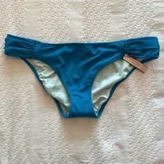 Victoria’s Secret The Knockout Bikini Swim Bottom, Size M, In Beautiful Peacock Blue / Teal With Aqua Lining. Nwt / Tags And Protective Liner Still Attached. Small Gold Vs Logo Plate On Back. Smoke-Free Home. (Matching Top In 36c Is Also Available In My Closet But It Has Been Worn Once.) Blue Bottoms For Spring Beach Party, Victoria's Secret Blue Bottoms For Summer, Victoria's Secret Blue Summer Bottoms, Victoria's Secret Blue Beach Bottoms, Fitted Blue Bottoms For Beach Party, Blue Victoria's Secret Swimwear For Spring, Victoria's Secret Blue Swimwear For Spring, Victoria's Secret Blue Stretch Swimwear, Victoria's Secret Fitted Bottoms For Pool