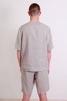 "Simple linen pajama set for summer, made in in organic certified by OEKO-TEX standard 100 linen. Top short sleeved, v-neck, straight form. Top center back length - 27.5\" (70 cm). Shorts with elasticated waist and loose style. Shorts inside seam length - 11\" (28 cm). Pajama linen quality - washed and should not shrink any more. On picture model wears pajama in natural undyed flax, size S. More colors of article please find here: www.etsy.com/listing/478907728/linen-white-pajama-set-mens-shorts Linen Pajama Set, Pijama Set, Simple Linen, White Pajamas, Linen Pajamas, Mens Pajamas Set, Linen Fashion, Linen White, Style Shorts