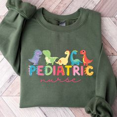 Pediatric Nurse Sweatshirt with Animals, Pediatric Nurse Gift, Nurse Appreciation, Peds Nurse Sweatshirt, Pediatrics Sweatshirt Crewneck  ORDERING 1- Please review all the information provided before placing an order 2- Select the sweatshirt type and size by using the drop down menu. 3- Select the color of the shirt using the following drop down menu. 4- Need more items? If you like to add more items to your order please press the back button and repeat steps 1-3 again. 5- Once all your desired Pediatric Christmas Shirt, Pediatric Nurse Shirts Ideas, Peds Nurse Shirt, Pediatric Nurse Shirt, Ob Nurse Sweatshirt, Peds Nurse, Pediatric Nurse, Nurse Sweatshirt, Sweatshirt Crewneck