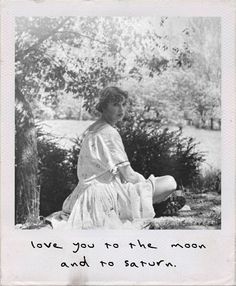 an old black and white photo with the words love you to the moon