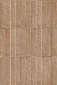 a brown tile wall with squares on it