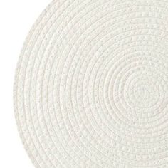 a white circular rug on a white background