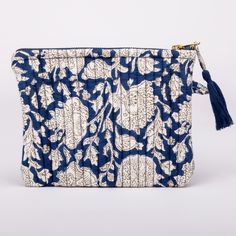 Introducing our exclusive Quilted Pouch, the perfect accessory for keeping your small treasures in order. This hand block printed pouch is not only stylish but also highly versatile. Made from 100% organic cotton, it features a top zip closure to ensure everything stays securely in place. Whether you need it for cosmetics, medicines, school or office supplies, this quilted pouch is designed to keep you organized on the go. . Top zip closure. 100% organic cotton. Quilted. Dimensions: 15.5 x 19 (C Small Pouch, Handmade Makeup Bag, Handmade Makeup, Block Print Quilt, Toiletry Pouch, Go Bags, Floral Accessories, Essential Bag, Pencil Pouch