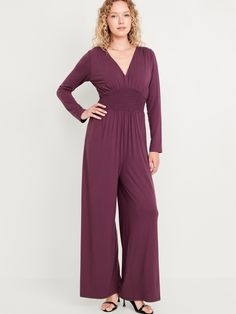 plunging v-neck long sleeves tie-strap at nape smocked waist shirred detail fitted at top wide leg 26" regular inseam 24" petite inseam 29" tall inseam models are approx.  5'9" and wear sizes s (4), l (12), and xl (18)machine wash according to the care instruction label  . Best Holiday gift for Women , perfect Jumpsuits for Christmas! Chic V-neck Jumpsuits And Rompers With Smocked Back, Chic Jumpsuits And Rompers With Smocked Back And V-neck, Chic Long Sleeve Jumpsuits And Rompers With Elastic Waistband, Fitted V-neck Jumpsuits And Rompers With Smocked Back, Spring Long Sleeve Jumpsuits And Rompers With Elastic Waistband, Spring Long Sleeve Jumpsuits With Elastic Waistband, Spring V-neck Jumpsuits And Rompers With Smocked Back, Spring Jumpsuits And Rompers With Smocked Back And V-neck, Petite Jumpsuit