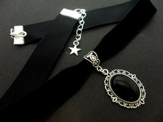 A ladies/girls black velvet 16mm (one inch) choker onyx stone charm necklace. Black Onyx Choker Jewelry, Gothic Black Jewelry With Black Band, Elegant Black Pendant Choker, Black Band Choker Jewelry, Adjustable Vintage Black Choker, Black Choker With Black Band, Formal Jewelry With Adjustable Black Band, Vintage Black Choker For Gifts, Black Pendant Choker As A Gift