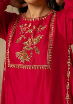 Featuring rani pink chiniya silk kurta set paired with hand embroidered detailed pants. Yoke is highlighted with anar motif using antique gold handwork. Anarkali Palazzo Set With Intricate Embroidery, Gold Palazzo Set With Intricate Embroidery And Straight Kurta, Transitional Straight Kurta Palazzo Set With Intricate Embroidery, Gold Chanderi Palazzo Set With Intricate Embroidery, Anarkali Raw Silk Palazzo Set With Intricate Embroidery, Designer Raw Silk Palazzo Set With Intricate Embroidery, Diwali Gold Embroidery Straight Kurta Salwar Kameez, Diwali Salwar Kameez With Gold Embroidery, Diwali Gold Embroidery Straight Salwar Kameez