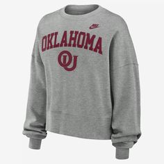 The Legacy Classic Arch Crew is made with dropped shoulder seams that help create an oversized look and brushed French terry lining for a warm, comfortable outer layer. Its cross-dyed pattern accentuates the Oklahoma Sooners details. Gray Fall Sweater For College, Nike Gray Tops With Ribbed Cuffs, Nike Collegiate Tops For Fall, Nike Gray Fleece Top, Gray Collegiate Long Sleeve Sweatshirt, Nike Heather Grey Sweatshirt For Fall, Nike Heather Grey Winter Sweatshirt, Nike Gray Long Sleeve Sweatshirt, Nike Tops For College In Fall