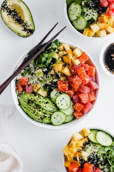 two bowls filled with different types of food