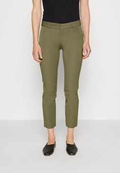 BANANA REPUBLIC SLOAN SLIM ANKLE PANT, 4, Regular COMFORT STRETCH: Our two-way stretch fabric gives this pant flexible comfort and recovery. It hugs your silhouette while retaining its shape. So soft, so stretchy, our customer-favorite Sloan pants make it easy to get excited about your day. Tailored for a skinny fit, this innovative fabric has incredible stretch to deliver a smooth, supportive fit that won't stretch out. SKINNY FIT: Formerly called the Modern Sloan, this pant has a higher rise and skinny fit through the hip, thigh, and leg. SLOAN: A customer favorite, this Bi-Stretch fabric engineered with high stretch and recovery for a smooth, supportive fit that won't lose its shape. Front and back pockets. Zip fly with hook and bar closure. 39% cotton, 56% rayon, 5% elastane. Machine w Chic Green Cropped Leg Bottoms, Chic Green Cropped Bottoms, Olive Tapered Leg Pants For Spring, Green Cropped Leg Bottoms For Work, Spring Olive Tapered Leg Pants, Olive Spring Trousers, Spring Olive Trousers, Green Stretch Cropped Leg Bottoms, Spring Khaki Ankle-length Chinos