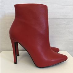 Red Booties Are A True Fashion Statement! Steal The Show In These Bad Boys. Heel Height 4.5". Insider Zipper. These Booties Are New With Tags. No Flaws. Red High Heel Faux Leather Heels, Fall Heeled Boots With Red Sole And Pointed Toe, Fall High Ankle Heeled Boots With Red Sole, High Ankle Heeled Boots With Red Sole For Fall, Trendy Ankle Boots With Red Sole, Red High Ankle Heeled Boots For Winter, Red Faux Leather Closed Toe Heels, Red Faux Leather High Heels, Red High Heeled Boots For Winter