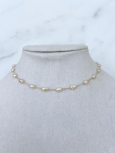 Pearl Necklace - made from porcelain pearls, detailed on an 18k gold filled chain, and has an extender chain attached for different lengths.   This simple and dainty Pearl necklace is perfect for everyday wear- even into the night! Necklace length: 15 3/4" with 2" extender Porcelain Pearl Size: 4mm Material: 18k Gold Filled Chain Pearl Chain Gold, Pearl Necklace Layering, Night Necklace, Dainty Pearl Necklace, Pearl Chain Necklace, Necklace Layering, Gold Pearl Necklace, Cute Necklace, Chain Gold