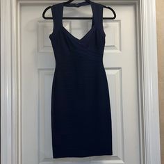 Navy Herve Lger Bandage Dress With Sexy Strap For The Back Of Neck. Elegant Blue Sleeveless Bandage Dress, Elegant Blue Bodycon Dress With Sweetheart Neckline, Elegant Fitted Blue Bandage Dress, Elegant Blue Fitted Bandage Dress, Bandage Dress Herve Leger, Herve Leger, Bandage Dress, The Back, Strapless Dress