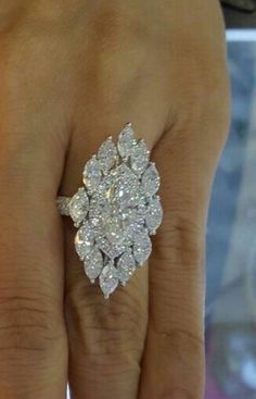 "Specification:- *Diamond Material : Cubic Zirconia *Total Diamond Weight : 4.01 Ct (Approx.) *Center Diamond Cut : Marquise *Center Diamond Dimension : 10*5 MM *Center Diamond Weight : 1.00 CT *Side Diamond Dimension: 2.00, 2.40, 2.50, 5*2.5 MM *Side Diamond Weight : 3.01 CT *Diamond Color : White *Diamond Clarity : VVS *Making Process: Handmade by our Experienced Staff. *Stamp: Our All Rings Stamped According to metal Purity (925 SIL/10K/14K/18K). Custom Order:- *We do Accept Custom order. Marquise Cut Diamond Ring, Fantasy Earrings, Gold Jewelry Necklace, Ladies Diamond Rings, Set Ring, Stone Engagement Rings, Fabulous Jewelry, Diamond Set, Ring Unique