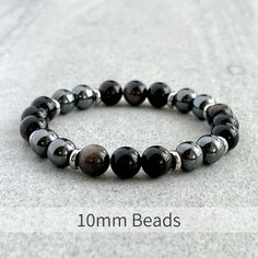 Men's beaded bracelet features: ~ 6mm, 8mm or 10mm Grey Obsidian beads ~ 6mm, 8mm or 10mm Hematite beads ~ 4mm, 6mm or 8mm stainless steel spacers ~ Strong, non-fraying elastic cord; simply slide bracelet on and off wrist ~ Comes packaged in a re-usable micro fibre pouch To ensure the perfect fit, please use the bracelet sizing instructions found in the photo gallery. Slide Bracelet, Mens Beaded Bracelets, Hematite Beads, The Grey, Beaded Bracelet, Necklaces Bracelets, Photo Gallery, Perfect Fit, Beaded Bracelets