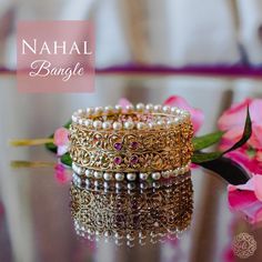 A magnificent piece crafted out of the pages of history! Dazzling bangle with brilliantly carved floral branches and adorned with pearl beads. Available in various sizes. Gold-plated on high-quality brass as base metal. Size 2.2 & 2.8 are in-stock & ready-to-ship. Delivery time frame for the Size 2.4 & 2.6 is 4-6 weeks. For custom or urgent requests, please contact support@alacouture.com. *Please Note: We use faux stones and beads in all of our jewelry. Floral Branch, Faux Stone, Base Metal, Pearl Beads, Bangles, Size 2, Plating, Carving, Brass