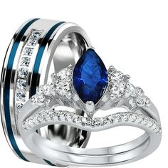 two wedding rings with blue and white diamonds