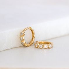 Diamond Bezel Huggie Hoops, Solid Gold Moissanite Hoop Earrings, 10K Gold Mini Hoops, Minimalist Earrings, Gift for Her - Etsy Halo Huggie Earrings As Gift, 14k Gold Huggie Earrings With Halo Detail, 14k Gold Huggie Earrings With Halo, Yellow Gold Huggie Earrings With Bezel Setting As Gift, 14k Gold Bezel Set Huggie Earrings For Anniversary, Yellow Gold Huggie Earrings Gift, Gift Halo Huggie Diamond Earrings, Halo Huggie Diamond Earrings Gift, Gold Huggie Earrings With Bezel Setting