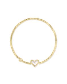 Like wearing your heart on your sleeve? Then the Ari Silver Pavé Heart Stretch Bracelet in White Crystal is perfect for you. Designed to fit any wrist, this minimal-yet-playful bracelet is the easiest way to bring some love and shine to your everyday stacks. Gold Stretch Bracelet, Iridescent Foil, Heart On Your Sleeve, Wrist Stacks, Platform Heels Boots, Book Candle, Platform Sandals Heels, Dichroic Glass, White Crystal