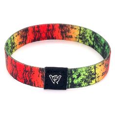 "Every little thing is gonna be alright wearing this weathered Rasta colored band. Available sizes: Extra Small 5.5\" Small 6.5\" Medium 7.5\" Anklet 9\" 3/8\" Width Reversible surf, music and beachy prints. Elastic blend material, can stretch to desired fit. Packaged in natural drawstring gift pouches. Machine washable. Chlorine and saltwater safe." Casual Black Wristband For Festival, Adjustable Casual Wristband For Everyday, Adjustable Casual Everyday Wristband, Casual Adjustable Wristband For Everyday, Casual Adjustable Wristband, Adjustable Multicolor Wristband For Summer, Casual Band Bracelets For Friendship, Rainbow Casual Bracelets For Everyday, Adjustable Band Bracelet Casual Style