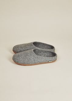 • If you are between sizes, we suggest sizing up• Felted wool• Leather suede soles• Low impact dyes• Handmade in Kyrgyzstan For a more narrow fit, we suggest this pair. Also available in men's sizes. These slippers are crafted by hand using felting techniques that are centuries old. Durable leather soles and cozy felted wool make these house shoes the ultimate hygge accessory. Treat your feet after a long day. Care: Wool felt wicks moisture and resists odor. If you need to clean your slippers, s Felting Techniques, Waffle Blanket, Stoneware Dinnerware Sets, Wool Slippers, Stoneware Dinnerware, Cozy Fits, House Shoes, Felted Wool, Women Artisans