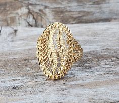 Beautiful Vintage filigree 14K solid yellow gold ring. Size 5 1/2 Weights 4.4g Marked 14K This is an estate item that was pre owned and loved by others. It is in good vintage condition. Please note all listing pictures are close up to show details of the item. Please look at the measurements and pictures before purchasing. Thank you for visiting! Mens Band Rings, Chevron Ring, Gifts For My Wife, Filigree Ring, Yellow Gold Ring, Solid Yellow, Diamond Cut, Yellow Gold Rings, Rings Statement