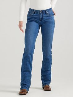 RIDING JEANS THAT NEVER QUIT Feel confident and comfortable in your riding clothes by giving yourself the best seat possible. Wrangler® women's Ultimate Riding Jeans are designed for fit, form, and function while on horseback, but they are bound to become your go-to jeans for working in the barn and running errands around town. Q-Baby women's jeans feature a mid-rise fit and no-gap waistband for full coverage when you're in the saddle as well as added stretch and flat seams for all-day comfort. Wrangler Riding Jeans, Wrangler Women, Riding Jeans, Riding Clothes, Never Quit, Baby Jeans, Womens Jeans Bootcut, On Horseback, Riding Outfit