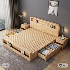 a bed with drawers underneath it in a room