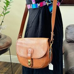 100% Authentic Dooney & Bourke Vintage Brown Leather Cross Body Bag Condition: Pre-Owned Good Condition No Rips Or Holes. Stiches Are Intact Goldtone Hardware Approx. Size: 9.5” W X 8” L X 3.5” D Please Check Each Photo Carefully To See Bag Details/ Condition. Final Sale! Feel Free To Pm Me For More Photos. Top Ratted Seller Thank You For Visiting My Closet! Brown Leather Crossbody Bag, Leather Cross Body Bag, Bag Details, Leather Cross, Dooney & Bourke Bags, Cross Body Bag, Vintage Brown, Dooney Bourke, Body Bag