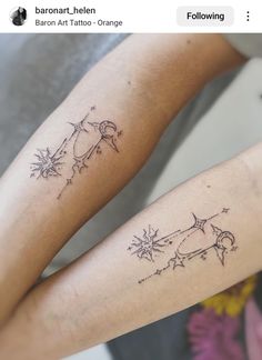 two people with tattoos on their arms, one is holding the other's arm