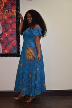 "* This Maxi African Dress features two side pockets and a back zipper *. Two color options are available; \"green and orange\" and \"blue and yellow\" * Traditional West African wax print fabric sourced from vendors at Makola Market in Central Accra *Wax print is 100% cotton *Non-stretchy fabric *Hand wash/Machine wash cold *Hand made in Ghana * This order ships within 1-3 business days via USPS from the US *This dress is only available in blue and yellow Available colors Primary colors *BLUE * Party Ankara Fabric Maxi Dress, Ankara Fabric Maxi Wedding Dress, Summer Ankara Fabric Maxi Dress, Black Ankara Fabric Maxi Dress, Blue Ankara Fabric Maxi Dress, Long African Dresses, African Maxi Dresses, Ankara Dress, African Wax Print