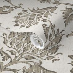 a wallpaper with an ornate design on it's side and the top part of the wall