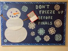 A paper snowman holds a book against a blue background with snowflakes all around. There are large paper cut out letters that read “Don’t freeze up before finals” and the snowflakes and the book have study tips written on them. Study Tips Bulletin Board Ra, Winter Bulletin Boards College, Finals Bulletin Board, Ra Bulletin Boards Winter, Winter Ra Bulletin Boards, Winter Ra Boards, Ra Closing Bulletin Board, Christmas Bulletin Board Ideas For Work