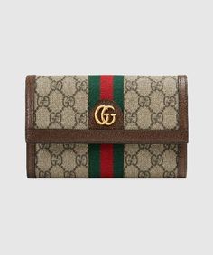 Description First new in the 1970s, the GG logo was an evolution of the original Gucci rhombi design from the 1930s, and from then it’s been an established symbol of Gucci’s heritage. The continental wallet combines the signature motif with the Web stripe—a timeless pairing that pays homage to Gucci’s roots. Size: 7.5″W x 4″W x 1.5″D / W19cm x H10cm x D4cm 100% genuine materials, matching the quality of the Gucci product; Beige/ebony GG Supreme canvas, a material with low environmental impact, with brown leather trim Green and red Web Gold-toned hardware Double G Twelve slots and two bill compartments Zipper coin pocket Snap button closure Comes with dustbag, ations, and pamphlets Our: The product is otherwise ! Rhombus Design, Gucci Gifts, Gucci Ophidia, Italy Print, Gg Logo, Card Case Wallet, Gucci Wallet, Digital Gifts, Wallet Fashion