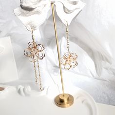 👂PRODUCT DETAILS Asymmetric Wire Floral Earrings by ELEVEN11DREAM - Material: High Quality Crystal & 14k gold plated + Swarovski Pearl - Size: Length 3.93in. & 2.75in. /Drop Length 3.34 in. & 2.16in. /width1.18 in.     Length 9cm & 7cm /Drop Length 7.5cm & 5.5cm/width3cm - Sold in pairs 🎈SHIPPING - All orders will be shipped within 1-3 business days after the order has been received - Ship all orders via USPS First-Class Mail - FREE SHIPPING for all USA domestic orders 💖PLEASE READ THE PRODUC Rose Gold Drop Flower Earrings For Spring, Flower Shaped Chandelier Earrings, Elegant Spring Chandelier Earrings, Gold Dangle Earrings With Flower Decoration, Rose Gold Flower-shaped Metal Earrings, Rose Gold Flower Charm Earrings For Party, Single Metal Flower Earring, Pierced Flower Earrings For Party, Rose Gold Metal Drop Flower Earrings