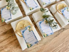 soap bars with lemon slices and eucalyptus leaves tied to them