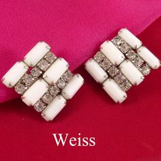 "These flashy vintage costume jewelry earrings were designed by Weiss and feature clear prong set rhinestones and white milk glass stones in a silver tone setting. Notice all the rhinestones are prong set. The earrings measure 1\" across  and are in good condition with no missing rhinestones and the clip ons work fine. They are signed WEISS on the back. If you love to wear fun earrings, these are for you! A pretty gift pouch is included. Please note I only ship within the U.S.A. Thank you!" Vintage White Clip-on Earrings For Anniversary, White Vintage Clip-on Earrings For Anniversary, Vintage White Crystal Jewelry, Retro White Earrings For Formal Occasions, White Retro Earrings For Formal Occasions, Retro White Jewelry For Anniversary, White Retro Jewelry For Anniversary, White Crystal Clip-on Earrings For Anniversary, White Retro Formal Earrings