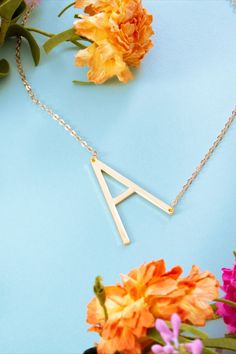 Add some sparkle and shine to your outfit with our Personalized Sideways Initial Necklace from Marleylilly. This personalized necklace can be either dressed up or dressed down and is a contemporary spin on the classic initial necklace favorite, thanks to the single letter’s unique sideways placement. Sideways Initial Necklace, Marley Lilly, Single Letter, Sparkle And Shine, Monogram Necklace, Letter S, Gorgeous Necklaces, Personalized Necklace, Initial Necklace