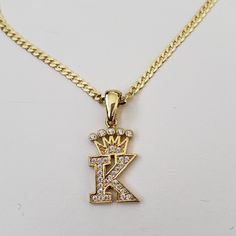 Yellow Gold Plate Sterling Silver Letter 'K' Crown Pendant Necklace Measures 18" Total Length Chain X 3mm Width; Pendant 1" Length Drop X 0.5" Width Chain Made In Italy Made In Turkey Initial Pendant Jewelry With Curb Chain For Gift, Gift Jewelry With Initial Pendant And Curb Chain, Gift Necklace With Initial Pendant And Curb Chain, Silver Initial Pendant With Curb Chain, Crown Pendant Necklace, Crown Pendant, Letter Pendant Necklace, Initial Necklace Gold, Letter K