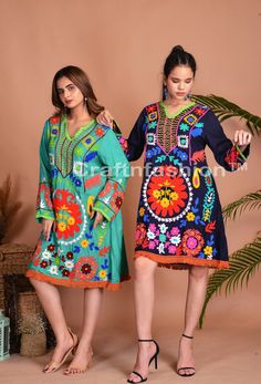 "PRODUCT CODE: 22EMBRTUNIC1 APPROX SIZE Height - Apprx 35-37\" inches  Bust -  Apprx 38-40\" Inches (Regular Size) Sleeve : Apprx 21-22\" Inches. Fabric : Rayon Suzani Embroidered. Dry Clean only Designer Floral Aari Embroidery work Tunic Top Dress . This colorful creation is a result of meticulous, hand- embroidered skill fully executed in the Aari work embroidery. Best Suitable for Beach Wear , Summer fashion , Sustainable fashion , Boho Fashion & More.. IMP NOTE: The colour of Picture shown a Casual Embroidered Boho Dress For Beach, Spring Hippie Boho Dress Embroidered, Hippie Boho Long Sleeve Dress For Beach Season, Hippie Long Sleeve Boho Dress For Beach Season, Spring Embroidered Hippie Boho Dress, Bohemian Long Sleeve Boho Dress For Beach Season, Long Sleeve Bohemian Dress For Beach Season, Long Sleeve Boho Dress For Beach Festivals, Bohemian Dresses With Floral Embroidery For Beach Season