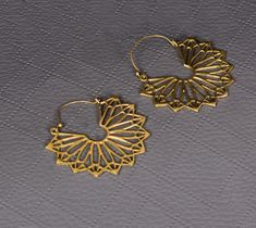 Louts mandala Flower Earring Gemstone-: Na Jewelery Category:- Earring Metal:-Brass -- T H E * Q U A L I T Y We buy raw gemstones directly from miners and then get them cut and polished at our workshop , Therefore saving some bucks (additional added fees and markups) avoiding a middle man and making sure of the authenticity of the gems. And we use top quality materials that are water safe (ideally) However it is highly recommended to avoid water since doing so will prolong the durability and qua Mandala Earrings, Middle Man, Flower Earring, Mandala Flower, Flower Mandala, Raw Gemstones, Jewelry Earrings Hoops, Flower Earrings, Gemstone Earrings