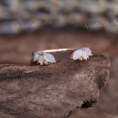 Antique Marquise Cut Opal Wedding Ring Dainty Rainbow Opal Bridal Stacking Matching Band Vinatge Rose Gold Opal Cluster Open Ring RING INFOEMATION ★ Open Wedding Band ⊹Stones - Natural Opal Cut - Marquise & Round shaped ⊹Band width - 1.5mm ⊹Metal - 14k or 18k solid gold (available in yellow, white or rose gold) ⊹Ring size - any sizes (size above 9 will be priced individually) ★Enter my shop: www.etsy.com/shop/ArcadiastudioUS MAKING & SHIPPING ★ Shipping ⊹It usually takes 2-3 weeks for production Round Opal Ring, Diamond And Opal Ring, Antique Opal Ring, Opal Wedding Ring Set, Opal Engagement Ring Rose Gold, Unique Opal Ring, Open Wedding Band, Opal Band Ring, Opal Promise Ring