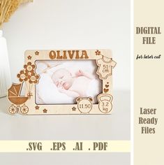 a wooden frame with a baby's photo on it and the words, olvia