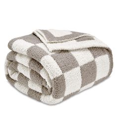 two towels stacked on top of each other in grey and white checkerboard pattern