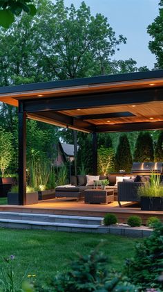 an outdoor living area is lit up at night