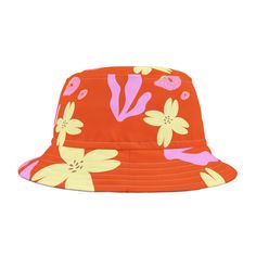 The combination of vibrant yellow, pink and orange creates a visually appealing contrast that stands out without overwhelming your outfit. The shell and flower pattern adds an exotic touch that's perfect for those who love to stand out. Ideal for sun protection or just adding a pop of personality to your outfit, the bucket hat shape is both practical and fashionable. Whether you're heading to the beach, a festival, or a casual day out, this hat has you covered. .: Material: 100% polyester .: Sewn-in label .: Made in USA Orange Summer Sun Hat For Vacation, Pink Bucket Hat For Beach Vacation, Pink Summer Bucket Hat For Vacation, Colorful Summer Bucket Hat With Curved Brim, Orange Sun Hat For Beach In Spring, Orange Sun Hat For Spring Beach Days, Orange Sun Hat For Spring Beach Outings, Orange Summer Hat For Beach Season, Multicolor Bucket Hat For Spring Vacation