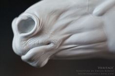 a close up of a white animal statue