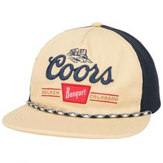 PRICES MAY VARY. Officially licensed apparel 100% Polyester woven blend fabric - Classic 5 panel low profile slouch structured crown with mesh back panels and flat brim Embroidered logo graphics at front with rope detail at brim Top button, sweat tapes, and details in contrast colors Adjustable plastic snap fastener on back - One size fits most (unisex adult sizing) Officially licensed Coors Banquet Rope Logo Canvas Snapback Hat. This black and brown "Coors Banquet" Snapback Hat is made from canvas and features a classic "Coors Banquet" graphics on the front with a matching rope above the bill and adjustable mesh snapback. Hats With Rope, Colorado Logo, Coors Banquet, Golden Colorado, Logo Graphic, Snapback Hat, Black Tan, Snapback Hats, Black And Tan